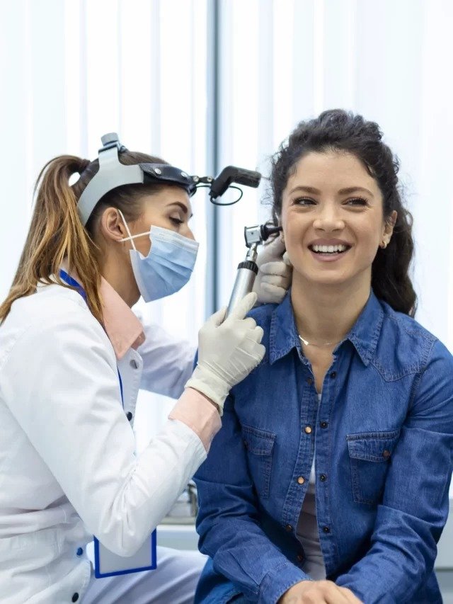 cropped-hearing-exam-otolaryngologist-doctor-checking-woman-s-ear-using-otoscope-auriscope-medical-clinic-1-scaled-1